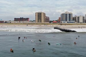Surfers flocked to the beach in Long Beach