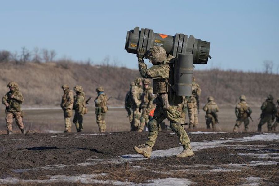 Ukrainian serviceman carries an antitank weapon