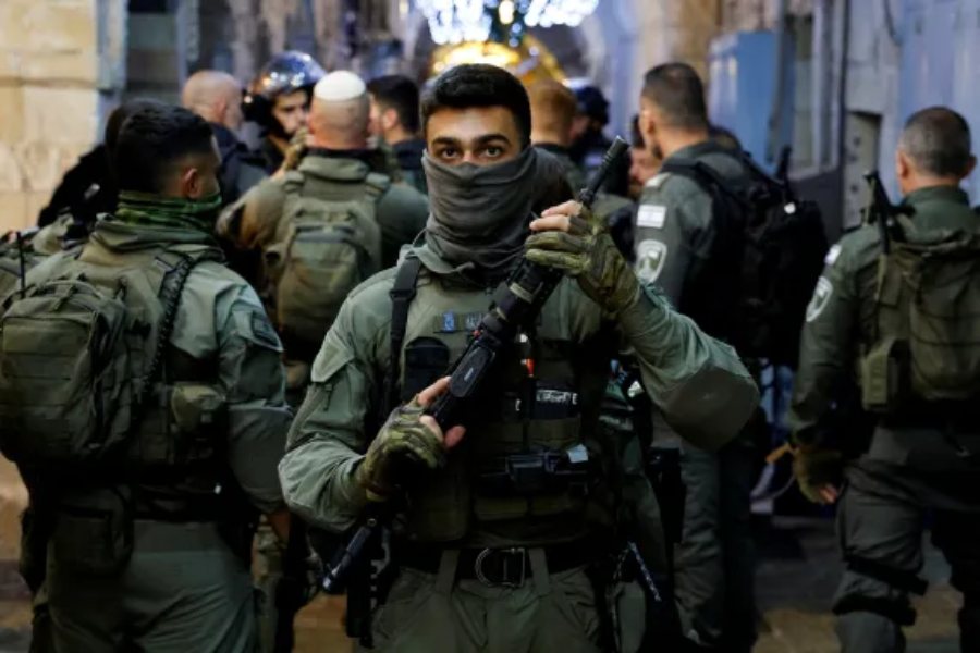 Israeli border policemen take position near the Al-Aqsa Mosque