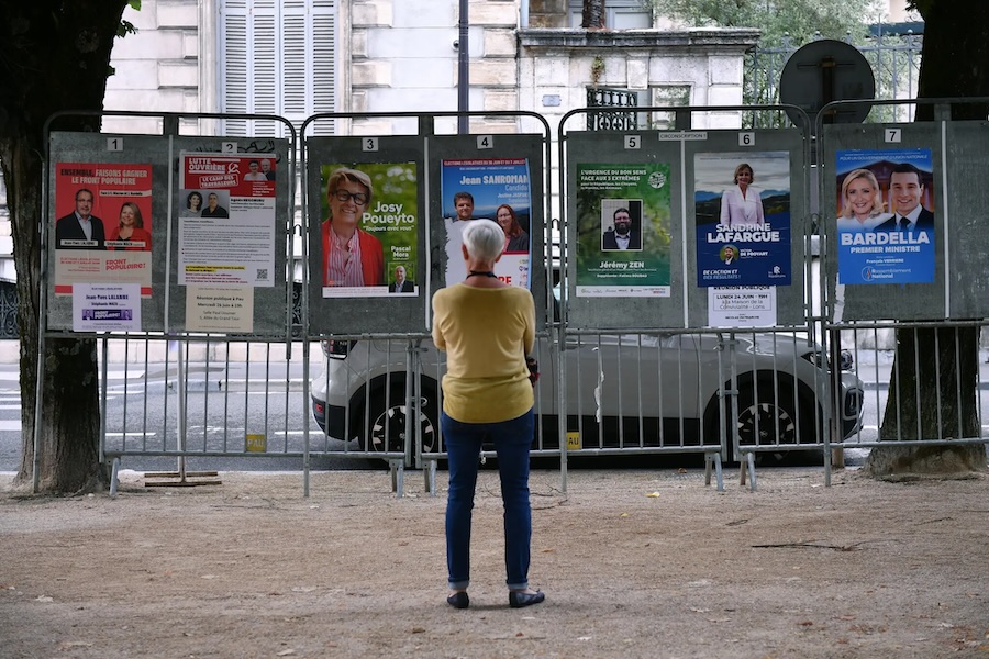 Election posters on Sunday in Pau, in southwestern France