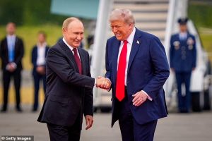 Donald Trump greets Vladimir Putin as he arrives in Alaska